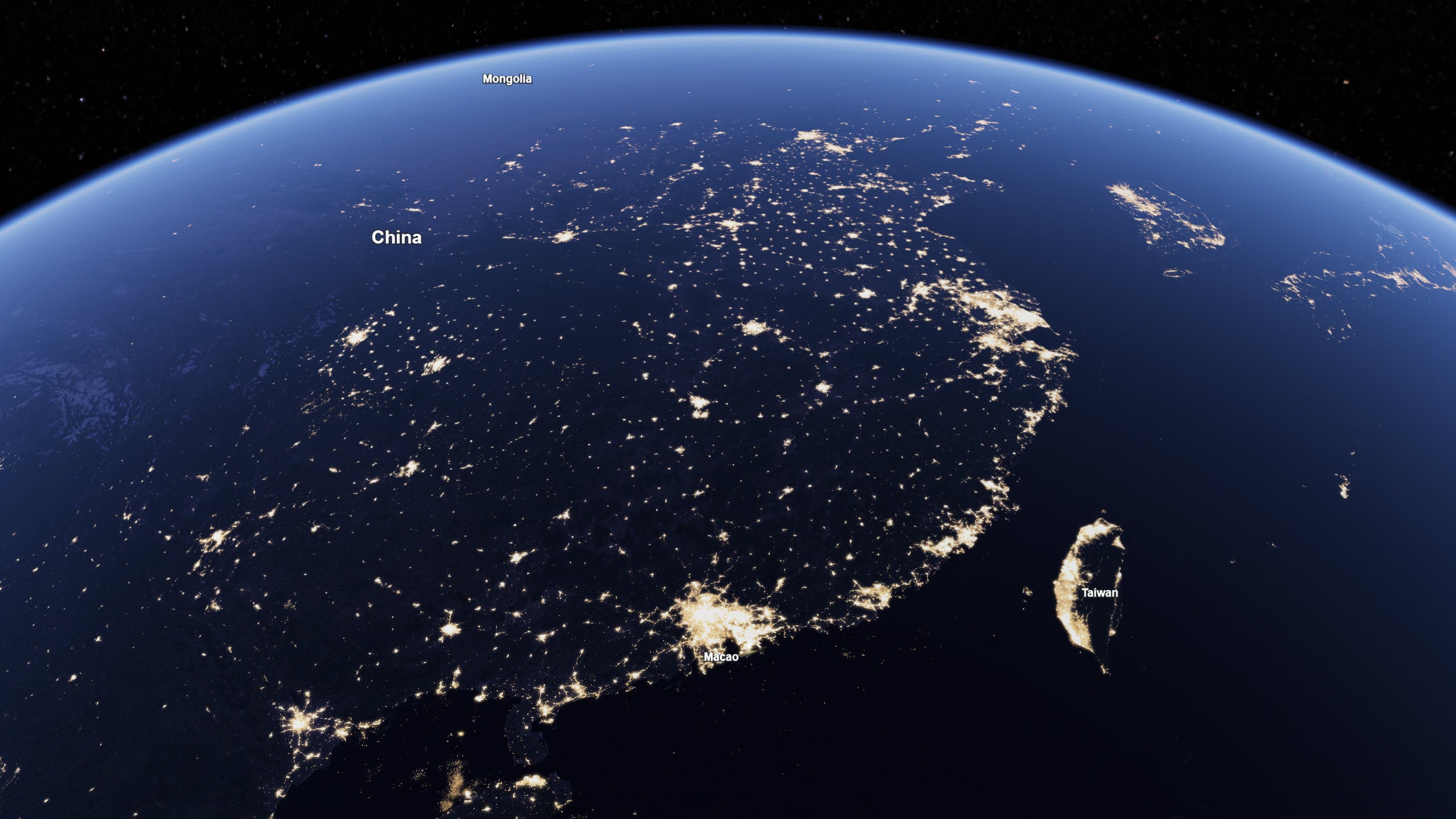 Night satellite view of China, with visible city lights.
